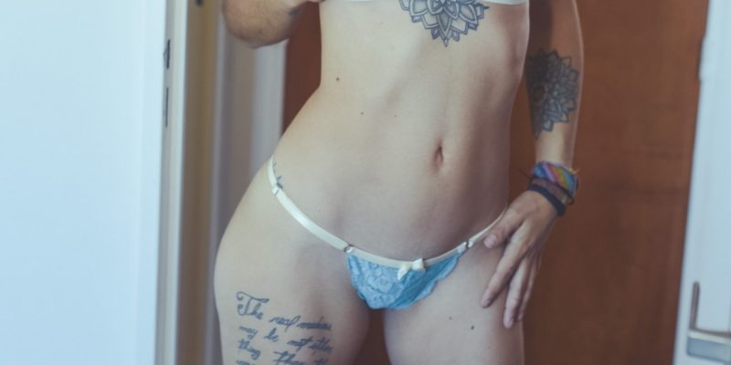 woman wearing blue lingerie set