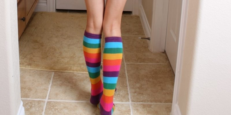 woman in rainbow socks